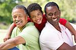 Grandfather With Son And Grandson In Park