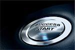 abstract success start button, metal material, blue color and black textured background. Focus on the main word and blur effect. Business concept