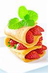 Strawberry crepe, mint leaf topping