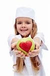 Eat fruits for a healthy life - little girl holding apple with heart