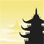 Asian Pagoda Silhouette at Dawn with yellow background and fog