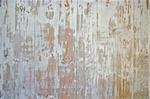 old wooden wall with worn paint