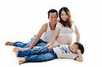 Asian family portrait sitting on floor
