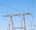 Power lines on the blue sky background