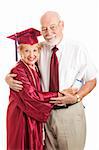 Senior woman graduating from college, standing with her proud, supporting husband.  Isolated on white.