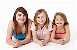 Three Girls Piled Up In Pyramid In Studio