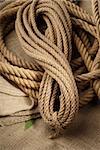 Naturel ropes twisted on a brown cloth