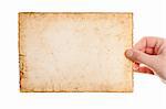 Handmade paper with gold edges in woman hand isolated on white background