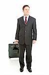 Businessman traveling with his suitcase.  Full body isolated view on white background.