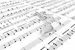 Glass musical note on a  background written notes