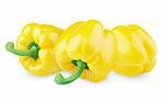 Three sweet yellow peppers isolated on white