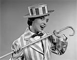 1950s VAUDEVILLE COSTUME WOMAN DANCING IN STRIPED SUIT AND HAT WITH CANE