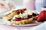 Close up of sliced scone with jam