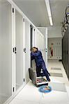 Technician working in server room