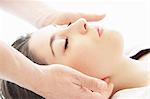 Woman having facial massage in spa