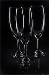Close-up of three empty wine glasses