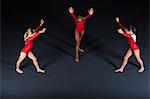 Young girl gymnasts preparing to perform handstands