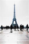 Tourists view Eiffel Tower from Palais de Chaillot, Paris, France