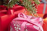 Festively wrapped Christmas gifts, close-up