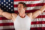 Male athlete in front of American flag