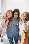 Young women with shopping bags, portrait