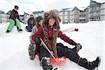 Teenagers Tobogganing, Mount Washington Ski Resort, Vancouver Island, British Columbia, Canada