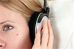 close up of girl listening to music