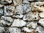 A wall of stones in a park