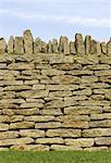 Dry stone wall detail, Batsford church, Gloucestershire, England, uk