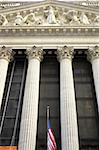 New york stock exchange building designed by George B Post, wall street, manhattan, new york city, America, usa, The orange flag in the bottom right corner denotes the current security level/threat