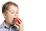 Child biting an apple with space for copy