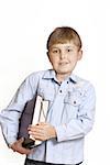 Boy with books under his arm