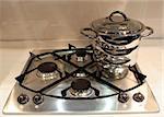 Stainless steel oven top with a pot