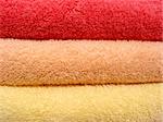 Stack of bright colorful clean towels