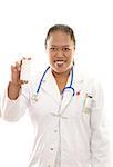 A smiling ethnic female doctor holding a bottle of pills, pharmaceuticals, vitamins ready for your text or label