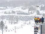 View from the top of a hill at Horseshoe ski resort, Ontario, falling snow