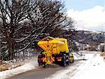 A gritter on a country lane in Conwy, Snowdonia, North Wales.