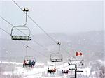 Chairlift at Horseshoe ski resort during heavy snowfall
