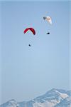 Two paragliders in Laax, Switzerland.