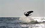 kiteboarder taking off for a jump