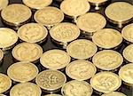 A hoard of fifty pound coins [sterling].