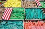 Various colour jelly sticks in a market