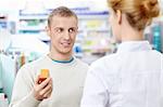 A young man at the pharmacy