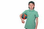 Happy young boy holds a ball on white background