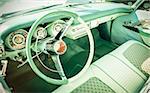 retro styled vehicle dashboard and steering wheel