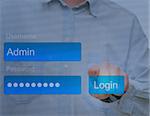 Hand Pushing Login Button on Touch Screen