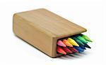 RainbowColored pencils in wooden case isolated on white background