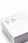 post it pad with the words 'to do' written in ink