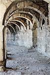 Arch corridor ancient amphitheater of Aspendos old ruin, Turkey.