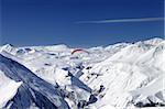 Sky gliding in snowy mountains. Caucasus, Georgia, ski resort Gudauri.